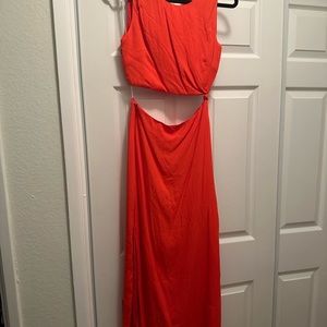 Lulu’s red (more reddish orange), sexy cutout dress. Sexy but classy.